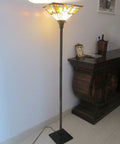 Tiffany Style Mission Floor Lamp With Real Stained Glass Shade, Vintage Uplight Torchiere in room corner near wooden cabinet