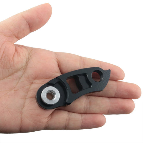 Hand holding Rear Derailleur Hanger Extension For Bicycle Fits 32T 36T 40T 42T 44T 46T 50T 52T 56T MTB And Road Bikes Tail Hook Extender CNC Aluminum Alloy Black