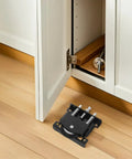 Black Metal Sliding Door Hardware Kit With Heavy Duty Closet Door Pulleys For Ultra Smooth Silent Operation Perfect For Barn Doors And Wardrobe Cabinets Featuring Robust Load Bearing Wheels That Fit T Shaped And U Shaped Tracks Boosts Home Value Now, black pulley on floor beside white wardrobe door