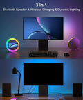Desktop setup featuring 4 In 1 Bluetooth Speaker With Lights And Wireless Charging Station For Teens And Dorm Rooms.