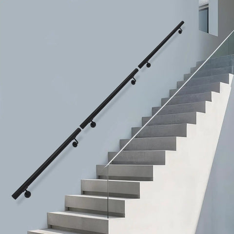 Flush Wall Mounted Stainless Steel Handrail Featuring Heavy Duty Sleek Black Cylinder With Rock Solid Grip And Knockout Antislip Coating Built Tough For Secure Stair Support And Everyday Hallway Use on staircase.
