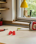 Workbench with tools and measuring tape, showcasing Stainless Steel Nut Two Pack For Fencing Equipment Repair, Precise Fit, Portable Size.