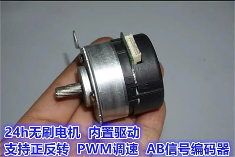 Brushless Servo Motor With PWM Speed Control For DC 9V To 24V 100 Line Encoder Built In Drive held in hand, side view