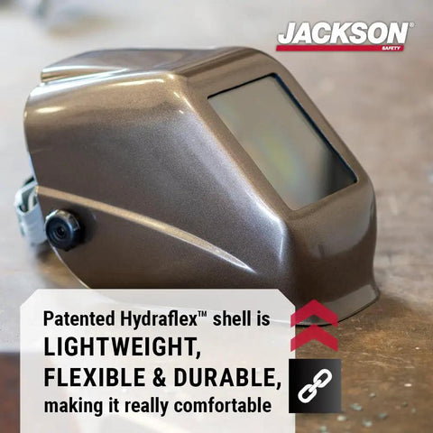 HLX 100 Welding Hood Lightweight Fixed Front Helmet Shade 10 ANSI Z87.1 Hydraflex Shell shown in heavy metal gray on a table.