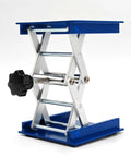 Lab jack stand, blue aluminum scissor lift with 4x4 in platform; manual height adjustment.
