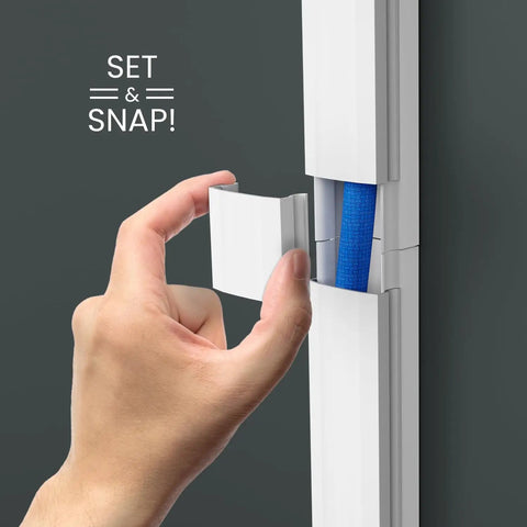 Hand snapping cover of Cord Hider 300 Inch Wall Cord Cover Kit for TVs and Cords, Cable Concealer and Raceway for Sleek Cable Management