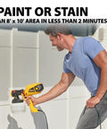 Man using Control Painter HVLP Handheld Paint Sprayer For Decks Fences Furniture And More That Sprays Coatings 5x Faster Than A Brush