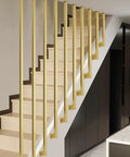 Real Deal Gold L Shape Stair Handrail Built Tough For Indoor Steps Heavy Duty Galvanized Metal Guardrail with sleek design on stairs.