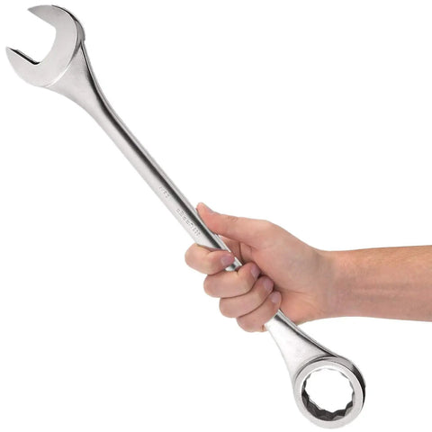 Hand holding 2-3/16 Inch Jumbo 12 Point Combination Wrench With Hot Drop Forged Construction And Satin Finish, Pro Grade Tool