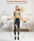 Woman using durable skipping rope for waist, arm, thigh, calf exercise to burn calories and improve coordination in living room.
