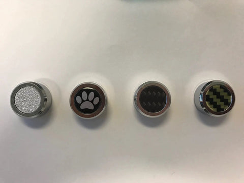 Slick Chrome License Plate Frame Screw Cover Caps With Hidden Bolt Design featuring paw and carbon fiber designs.
