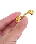 Hand holding a 12 Pack Vintage Gold Cabinet Pull for Small Drawers and Jewelry Boxes, mini dope retro handle, durable metal hardware