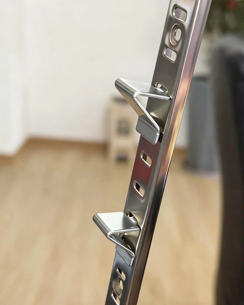Heavy Hitter 18 Piece Silver Steel Shelf Clip Kit Built Tough For Knockout Wall Storage Adjustable Pilaster Strip Bracket close-up.