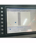Front view of Flow waterjet cutting machine control panel displaying Flow software interface.