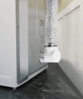 Flexible 4 Inch Dryer Vent Hose Kit For Tight Spaces With Double 90 Degree Elbow And 9.84 Ft Aluminum Exhaust Hose attached to dryer