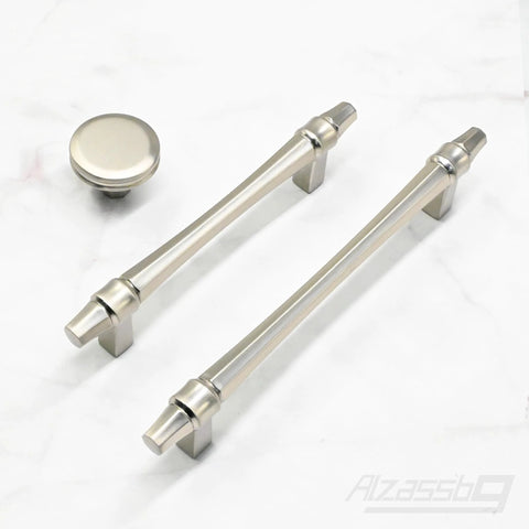 Six Pack Brushed Satin Nickel Cabinet Knobs One And One Quarter Inch Diameter Round Kitchen Knobs and drawer handles on white background