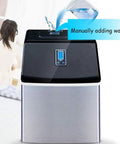 Portable Countertop Ice Maker Dropping Fresh Cubes Fast With A Clear Viewing Window Crafted From Safe ABS Plastic ideal for manual water filling.
