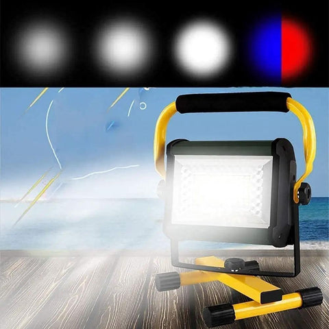Spot Lighting Led Spot Lighting 100W Led Floodlight with 4 Brightness,，，illuminating a beach scene with a sturdy yellow handle.