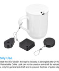 Hella Secure Retractable Cable Lock With Sturdy Double Sided Adhesive Mounting Pad For Phones TV Boxes And Remotes Black 4 Pack with mug and components.