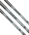 Six Piece Ladies Flex Golf Iron Shafts Parallel Tip Lightweight Mid Launch Profile Boosts Birdie Yardages And Helps You Fly Straight Down The Range With Serious Power close-up image of three steel gray iron shafts with markings.