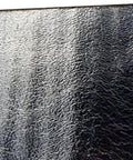 Double Sided Reflective Foam Insulation Roll That Blows Away Utility Bills Blocks Radiant Heat Quick Peel Hang For Attics Walls And Crawlspaces R8 Rated Ultra Thick Five Millimeter Core Seventy Two By Two Hundred Feet Made In Usa close-up view of shiny reflective surface