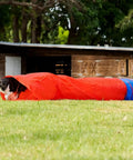 Dog Agility Tunnel With Chute Training Gear 24 Inch Diameter 32 Inch Tunnel And 152 Inch Chute in use by a dog outdoors