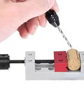 50mm Aluminum Bench Vise Clamp For Drill Press Table Holds Objects Up To 50mm with precision threaded rod in use, holding cork