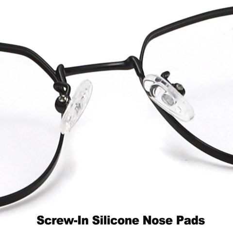 Close-up of No Sweat Silicone Eyeglasses Nose Pads on black frame glasses, showing two clear screw-in nose pads.