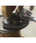 Universal Gland Nut Wrench for Hydraulic Cylinders removing gland nut on equipment, 42CrMo steel, 1"-3.75" range shown in use.