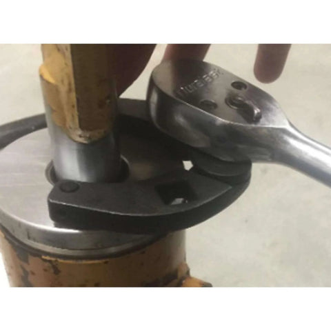 Universal Gland Nut Wrench for Hydraulic Cylinders removing gland nut on equipment, 42CrMo steel, 1"-3.75" range shown in use.