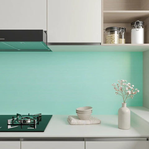 Thick Pastel Mint Metallic Peel And Stick Wallpaper With Brushed Matte Surface Gives Your Space A Straight Up Glow Up self-adhesive backsplash in a modern kitchen.
