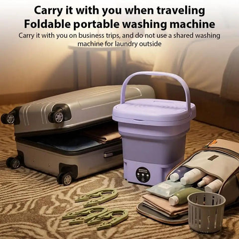 No Hustle Foldable Washing Machine With Three Deep Clean Settings And Super Chill Spin Dry for travel use next to suitcase and toiletries.