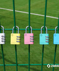 3 Digit Padlock For School Locker Gym Sports Fence Toolbox Case Outdoor Pink With 1000 Possible Codes And Four Pin Security For Serious Theft Protection And Peace Of Mind Lock It Down, pink padlock on green fence.