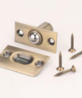 Stunning Golden Roller Latch With Adjustable Tension For Closet Cupboard Door Hidden Beads Lock Hardware on display with screws.