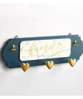 Slick Wall Mounted Wooden Coat Rack With Heavy Duty Hooks And Knockout Plaque Design Dang Neat Entryway Organizer For Keys Hats Robes Towels In Kitchen And Office Spaces featuring blue panel and gold heart hooks.
