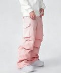 Men's Waterproof Insulated Ski Pants With Baggy Snowboard Style Fit For Winter Outdoor Sports in pink with side pockets.