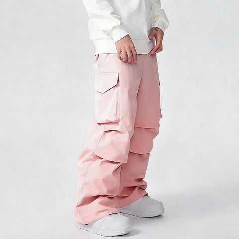 Men's Waterproof Insulated Ski Pants With Baggy Snowboard Style Fit For Winter Outdoor Sports in pink with side pockets.