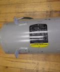 1 HP Industrial Motor, 575V 3 Phase Workhorse, 850 RPM, Open Enclosure, Frame 56Y on wooden floor