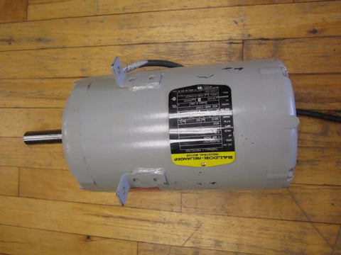 1 HP Industrial Motor, 575V 3 Phase Workhorse, 850 RPM, Open Enclosure, Frame 56Y on wooden floor