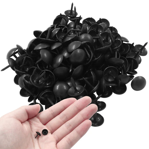 Heavy Duty Matte Black Upholstery Tacks In Two Hundred Pack Featuring Smooth Nine Millimeter Caps for DIY projects shown in hand.