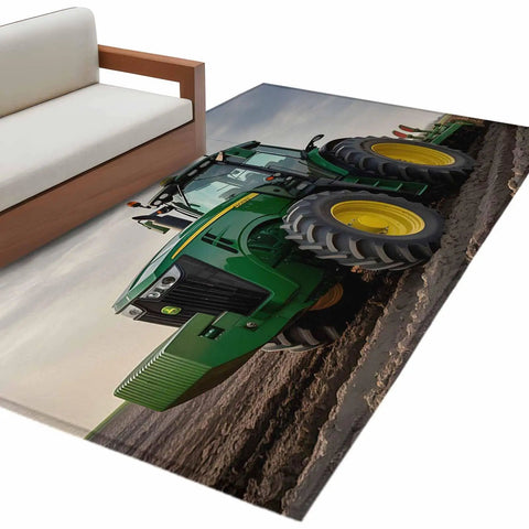 3x5 Machine Washable Farmhouse Rug For Living Room And Bedroom With Green Tractor Farm Decor next to a sofa.