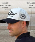 Side view of person wearing Performance Trucker Golf Hat Black For Men And Active Lifestyles Breathable Mesh Water Resistant