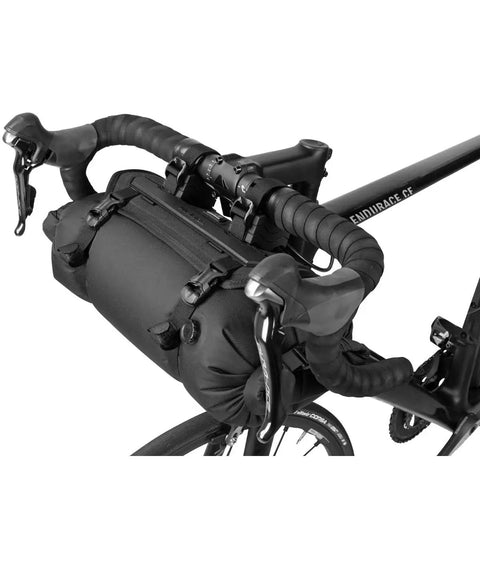 Frontloader 8 Liter Bar Bag For Bike Handlebar Mount, waterproof, 50x15x15 cm, mounted on a road bike with quick release straps.