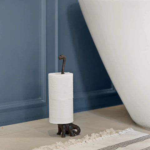 Rustic Cat Paper Towel Holder In Gold Metal Free Standing Floor Or Countertop Stand Holds Paper Towels Or Toilet Paper With Totally Farmhouse Style Decor For Kitchen And Bath next to tub.