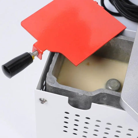 Portable Manual Edge Banding Machine glue compartment detail, 10 to 45 millimeters banding tape glue system, 110V 765W capacity.