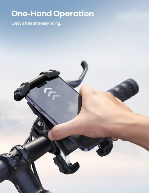Heavy Duty Motorcycle Mount and Bike Phone Holder with One Hand Lock That Eats up Bumps Case Safe Shake Proof Shock Resistant Grip with phone being mounted.