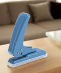 Compact Five Point Five Millimeter Hole Puncher Built Tough Metal Handheld Punch for paper crafts on desk