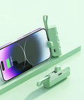 No Sweat Battery Charging Case For Rechargeable Cells Solderless DIY Power Bank Housing with phone in green setting.