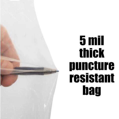 5 mil thick Clear Plastic Dust Collector Replacement Bags 5 Pack For Shop Pros, demonstrating puncture resistance with a pen