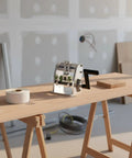 Portable Edge Tape Slitter And Edge Banding Cutter for woodworkers on a wooden workbench, manual 80mm width trim tool visible
